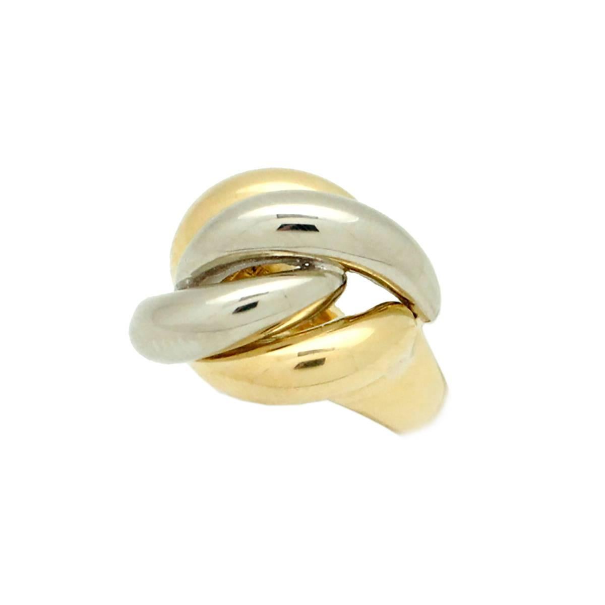 This gorgeous Signed Tiffany & Co. White and Yellow 18kt Gold Swirling Waves Ring is a size 3.5 and can be sized up or down for the client. This ring weighs 10.3grams and the top of the ring is .50 inches in width by .50 inches in length.

This