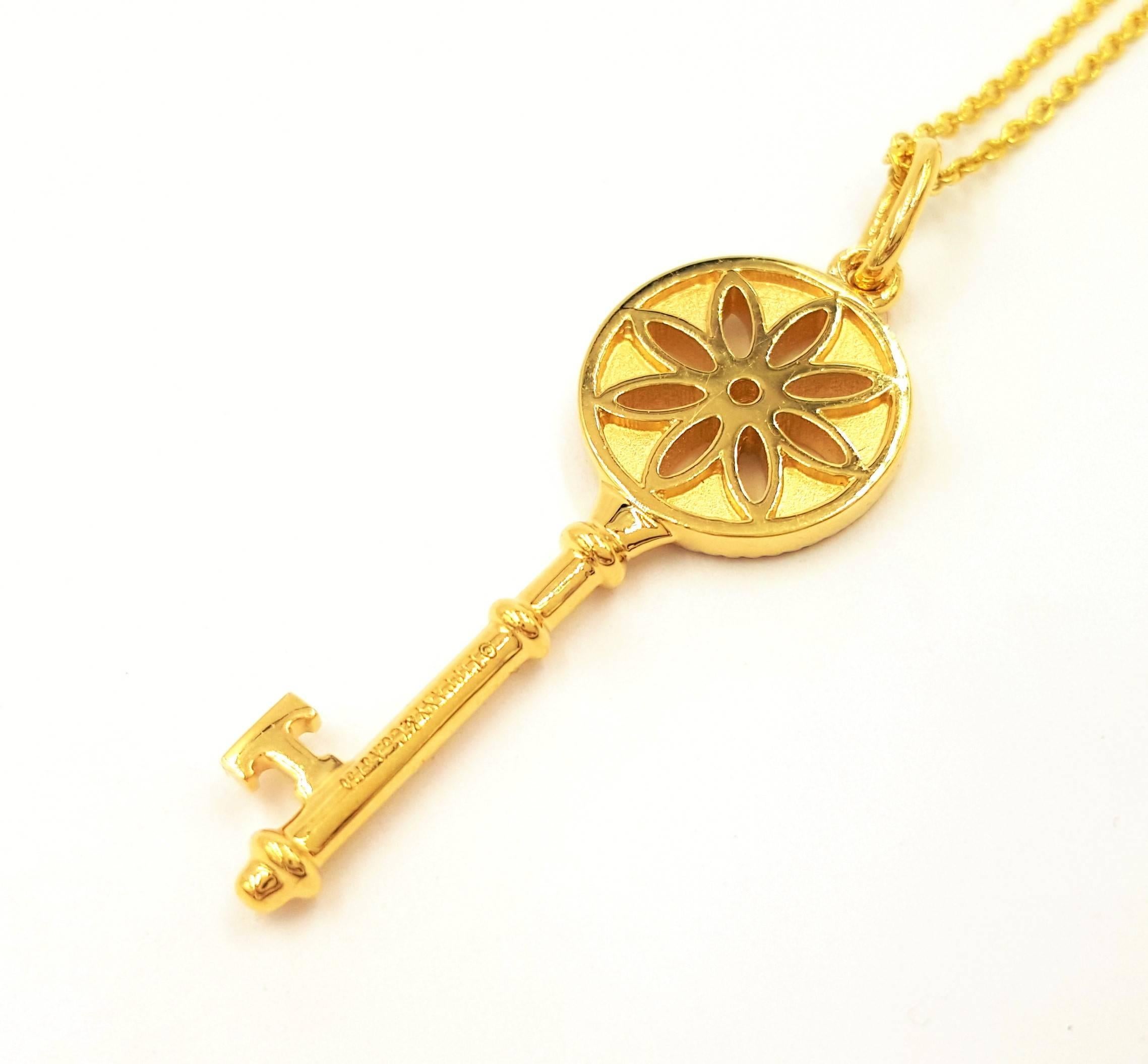 Women's Signed Tiffany & Co. Diamond Featured in A Gold Daisy Key Pendant