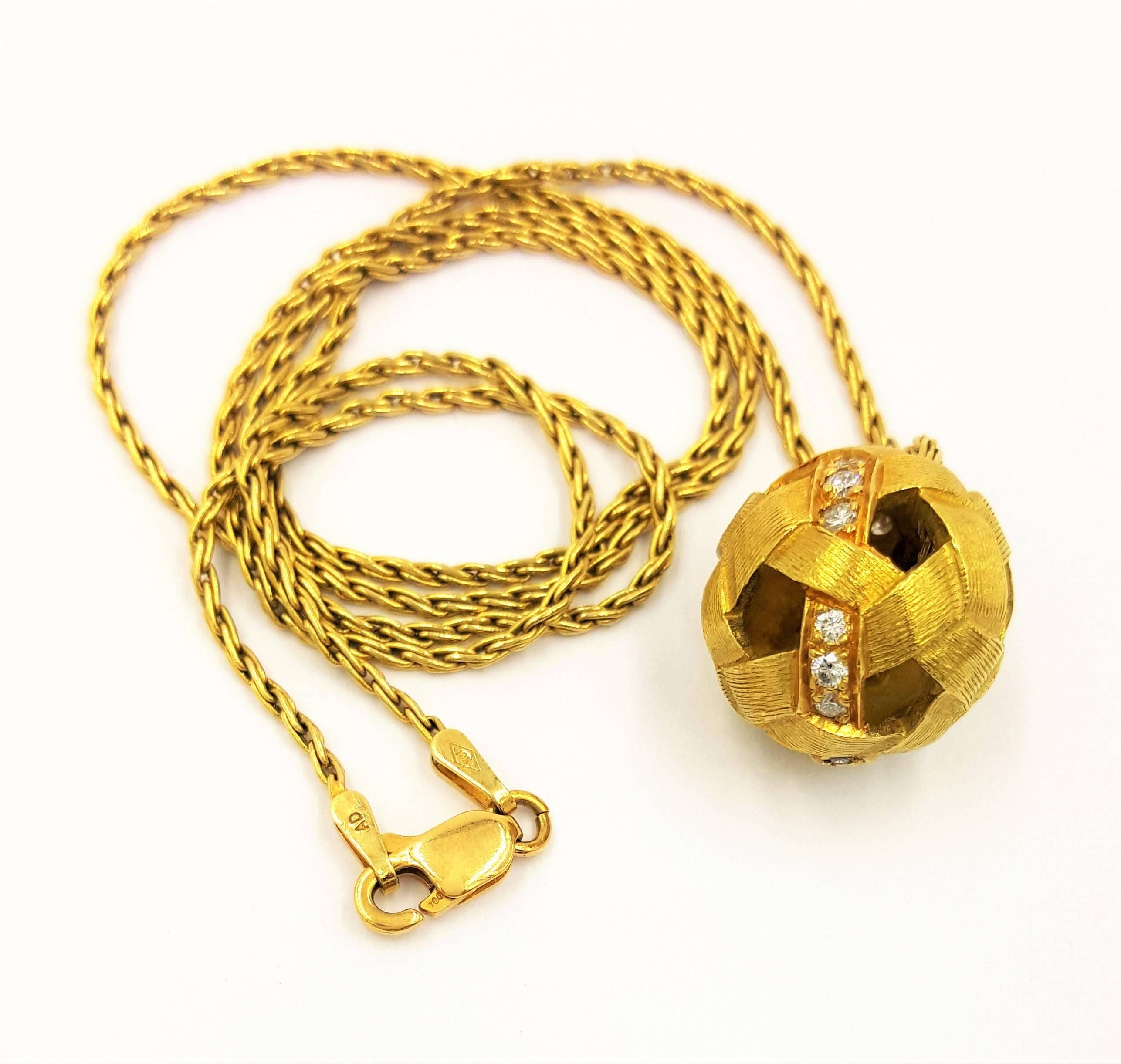 This gorgeous yet fun Soccer Ball Diamond Pendant and 18kt Necklace by French Designer Etienne Perret features .75 Carats of VS clarity, G white color diamonds set in a textured 18kt yellow gold soccer ball and is fun and perfect for everyone,