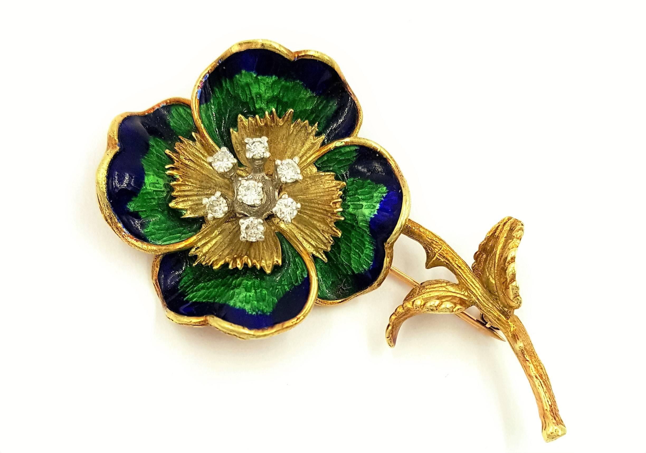 This stunning 1980's 14kt Yellow Gold Royal Blue and Vivid Green Enamel Flower is in immaculate condition. Perfect in every way with no enamel scratches or chips whatsoever. The flower is accented with .50 Carats of round brilliant cut diamonds,