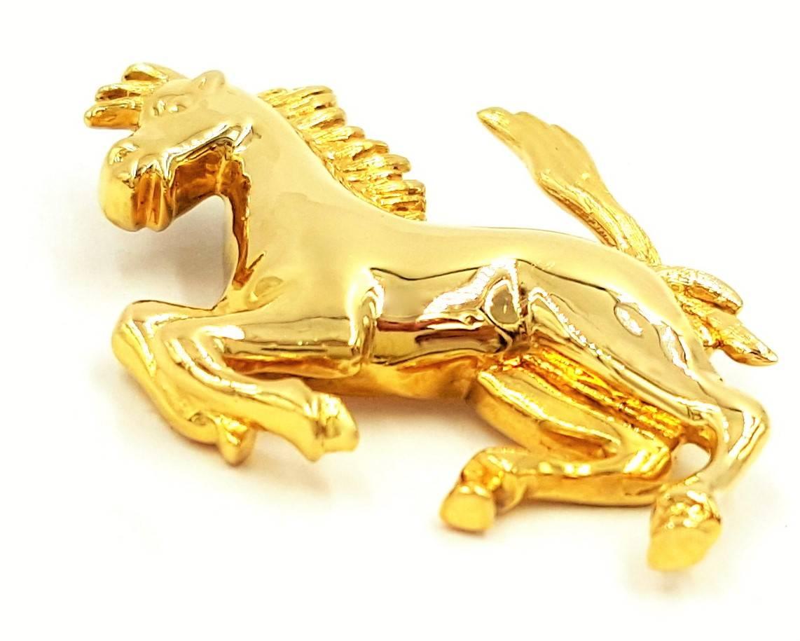 Gracefully crafted in house from 18kt gold and modeled after the lifelong bond formed between a filly and its rider. This adorable pendant is perfect for competitive equestrians and horse enthusiasts of all ages. This beautiful pendant is believed