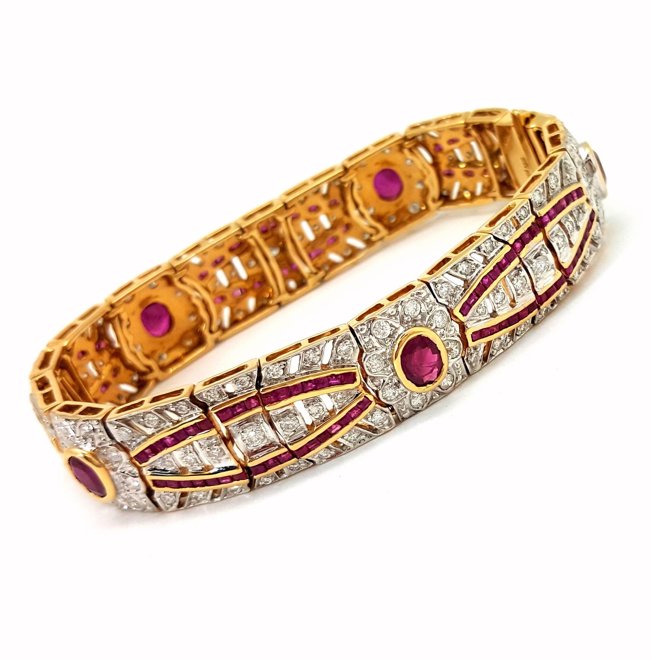 This stunning 18k yellow gold diamond and ruby bracelet is set with 155 round brilliant diamonds. The diamonds are G in color and VS is clarity. There are 172 princess cut rubies that are a pink to a blood-red color. There are five oval rubies that