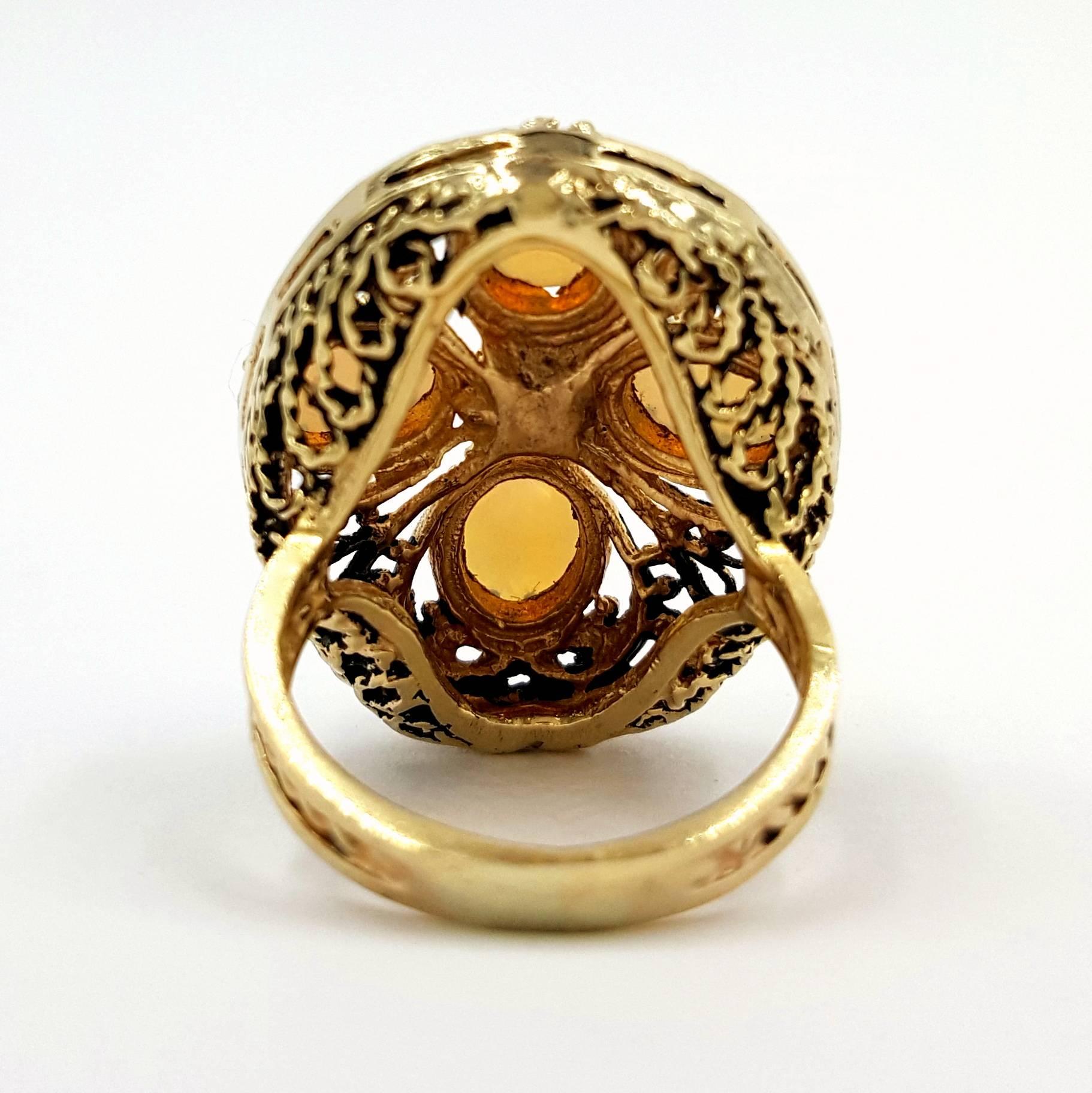 Contemporary Ornate circa 1970's 18kt Yellow Gold Filigree Ethiopian Opal Exotic Diamond Ring For Sale