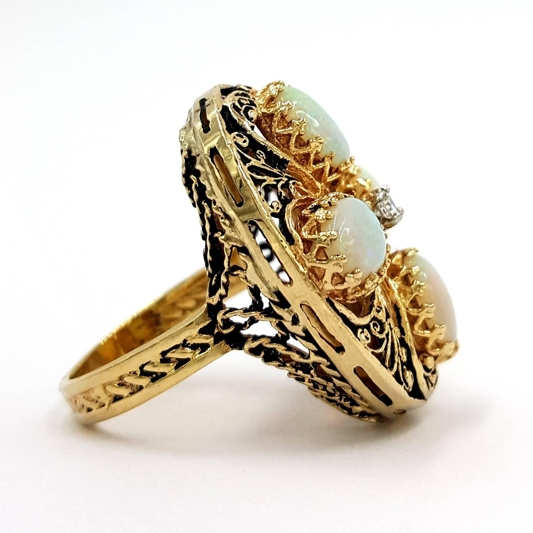 Ornate circa 1970's 18kt Yellow Gold Filigree Ethiopian Opal Exotic Diamond Ring In Excellent Condition For Sale In Scottsdale, AZ