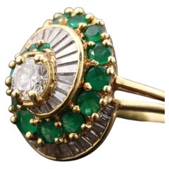 18K 1.23 CTW Diamond and Emerald Swirl cocktail Ring
