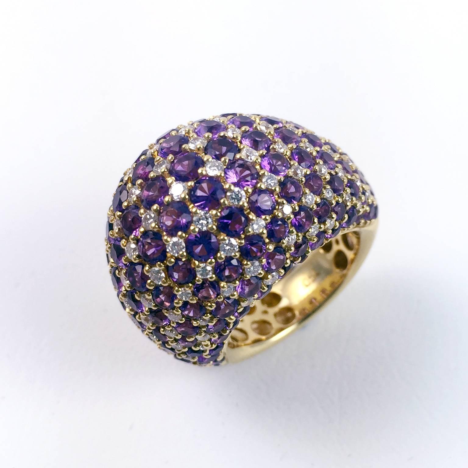 Brilliant cut purple sapphires and diamonds set on a perfectly shaped dome ring.

Sapphires: 8.52 cts , Diamonds : 1.19 cts
weight : 16.35 Grams

Ring Size: 4 ½ (US), 48+ (European). Dome rings are typically (but not exclusively) worn on the