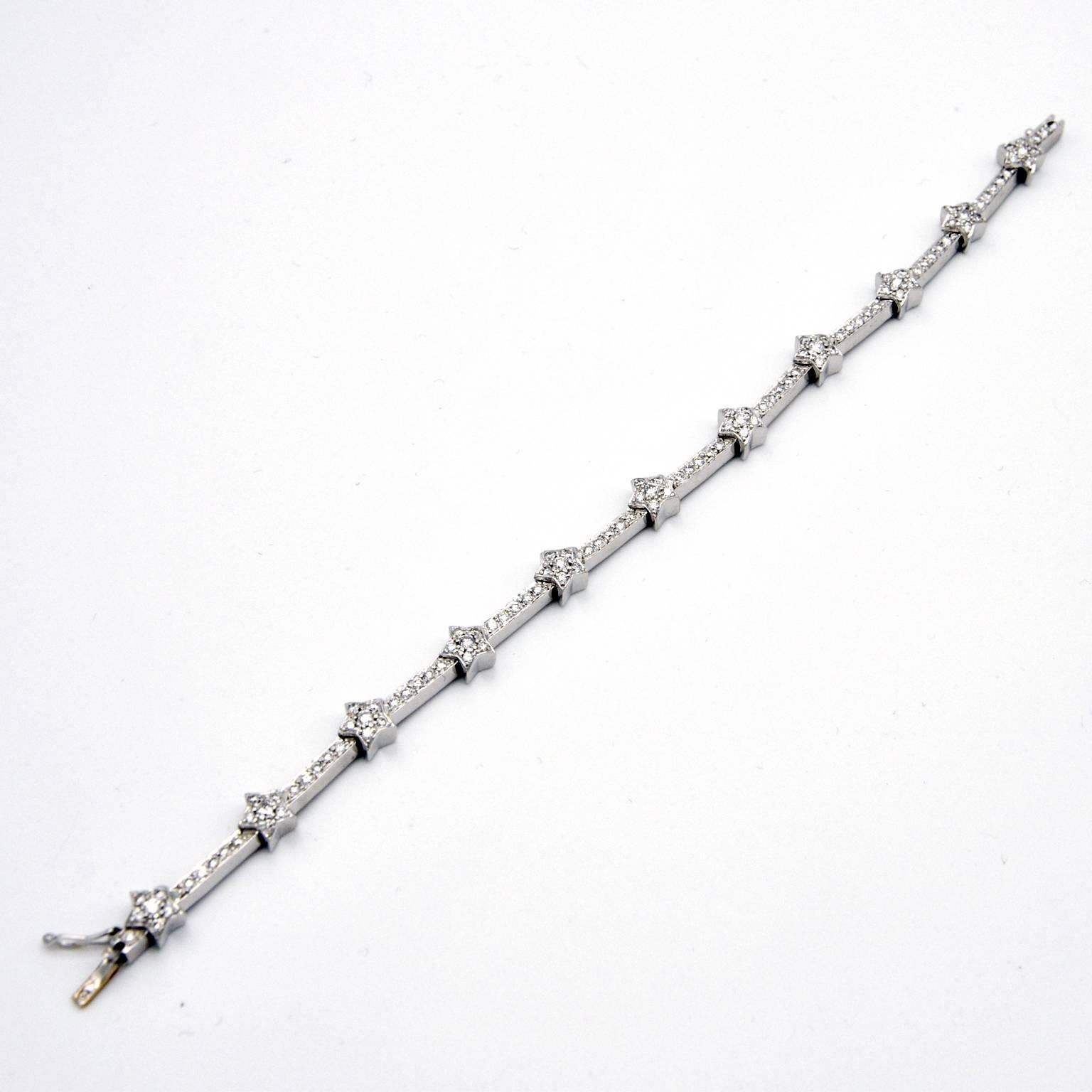 A delicate and fashionable tennis Bracelet consisting of stars linked one to the other by a stripe of white gold. the whole jewel is densely set with 1.75 carat of white diamonds.

The price shown include french VAT. A 16% rebate will be made if