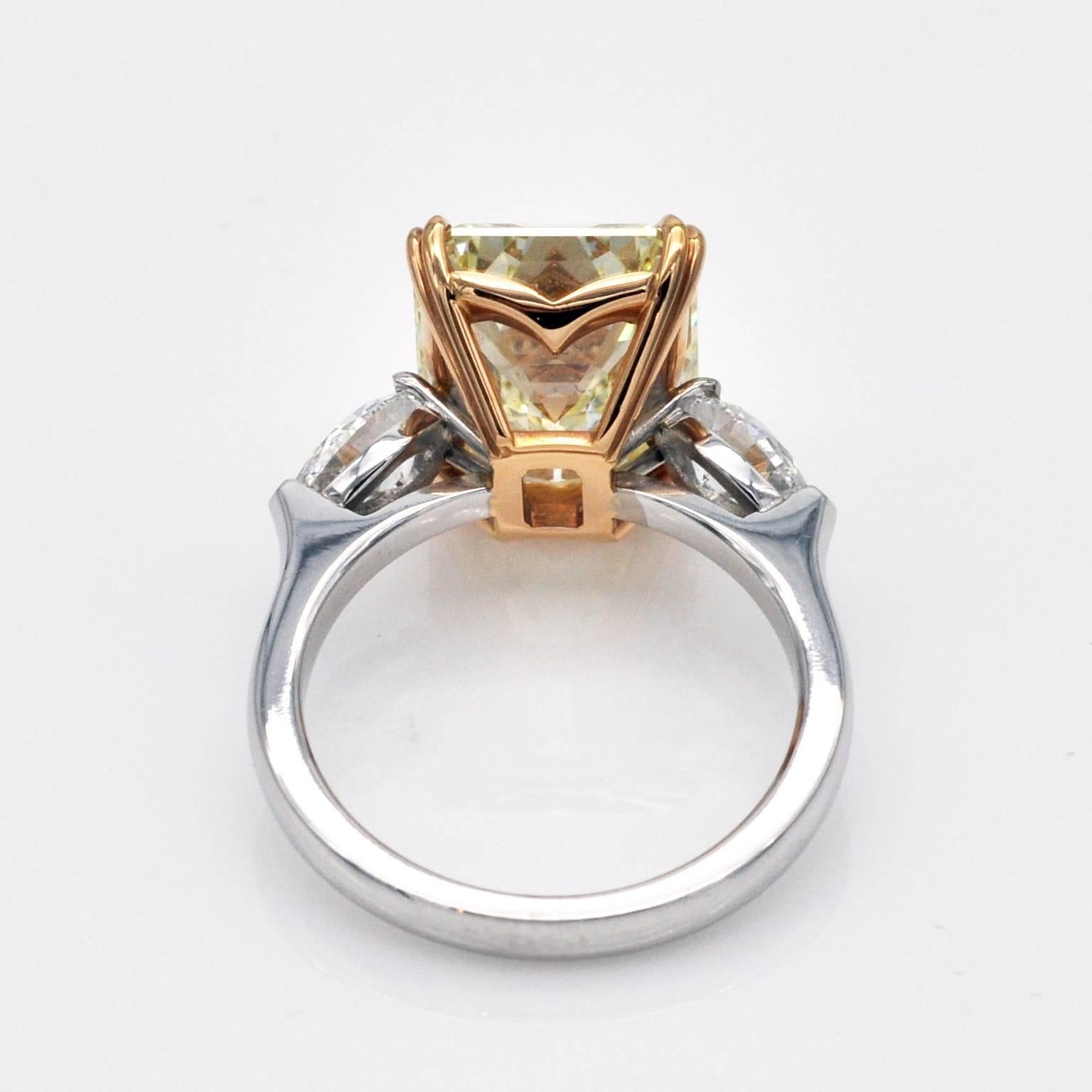 Contemporary 7.66 Carat GIA Certified Fancy Yellow Emerald Cut Diamond Gold Solitaire Ring