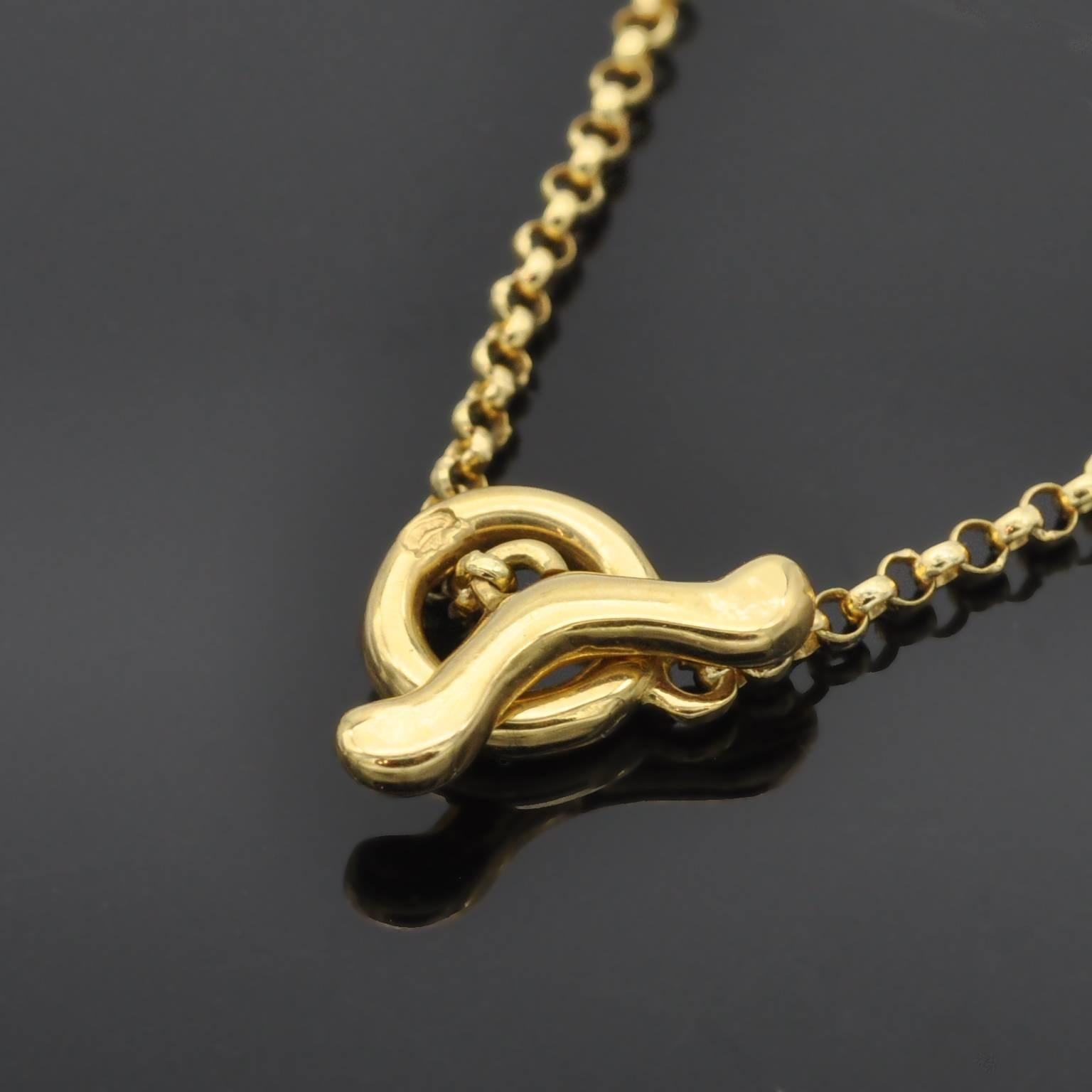 Sugarloaf Cabochon Modern Garnet and Gold Cross Pendant Necklace For Sale