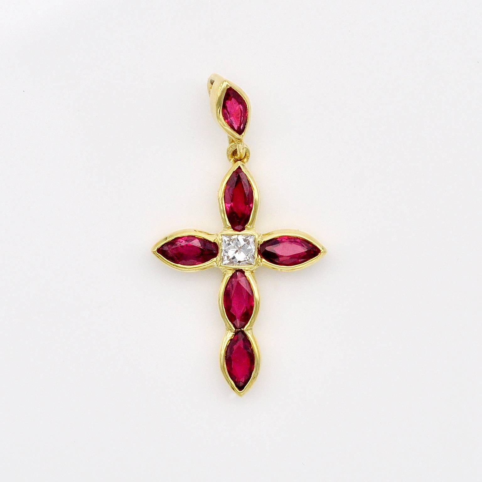 Elegant cross Pendant made of marquise shaped rubies and a princess cut diamond in its center.
Rubies : 1,23 carat
Diamond: 0,11