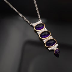 Halskette mit Anhänger aus 18-karätigem Gelb- und Weißgold mit Cabochon-Amethyst und Diamanten