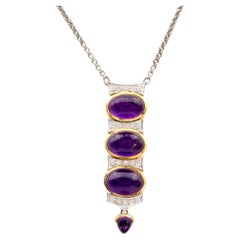 Halskette mit Anhänger aus 18-karätigem Gelb- und Weißgold mit Cabochon-Amethyst und Diamanten