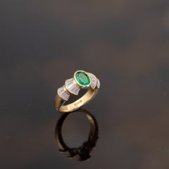 Vivid Green 1.25 Carat Oval Emerald Tapered Baguette Diamond 18K Gold Ring