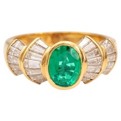 Vivid Green 1.25 Carat Oval Emerald Tapered Baguette Diamond 18K Gold Ring