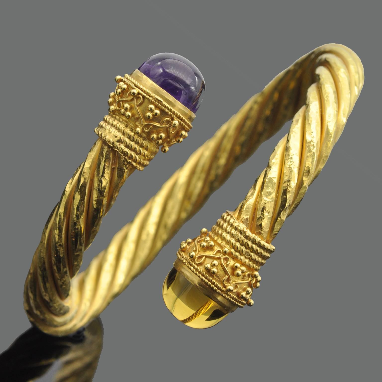 Greek revival even etruscan revival ! hammered gold , twirls, amethyst and citrine cabochon bezel set. Highly desirable bracelet.
You can wear two together  (see ref LU47233575101)