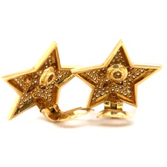 Van Cleef & Arpels – Clip-Ohrringe aus 18-karätigem Gelbgold mit einem 3,32-Karat-Diamanten in Sternform