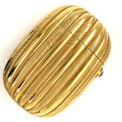 Bulgari Clutch-Etui „Miniaudiere“ aus 18-karätigem Gelbgold mit rotem Edelstein-Cabochon