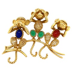 18-karätige Gelbgold-Brosche „Die drei weisen Affen“ von Van Cleef & Arpels mit Karneol und gefärbtem Ch