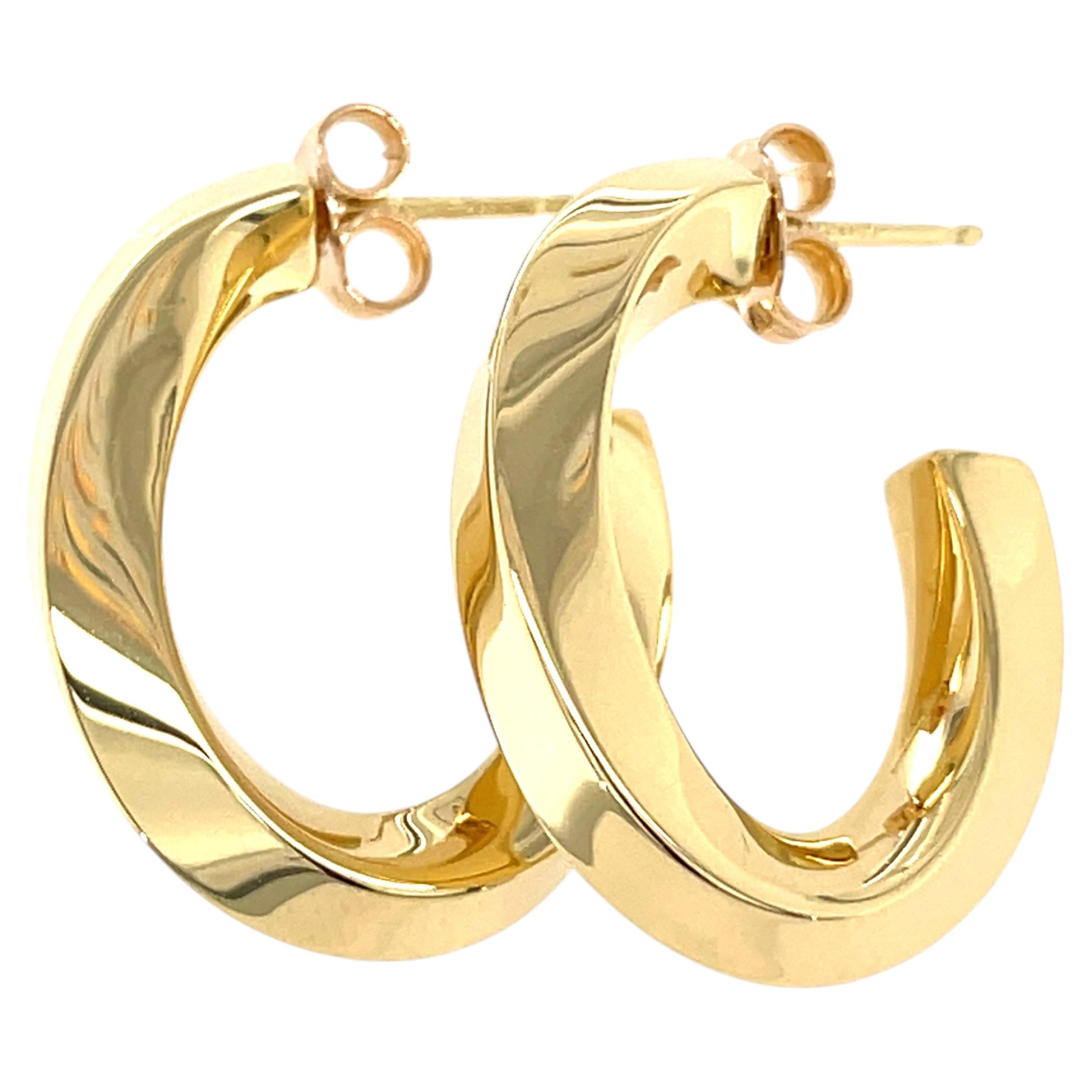 Orecchini a bottone a cerchio “Knife-Edge Twist” in oro giallo 18 carati di Tiffany & Co.