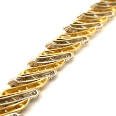 Hammerman Brothers: Pulsera de oro bicolor de 18 quilates y diamantes. Peso en quilates: 12,25 c