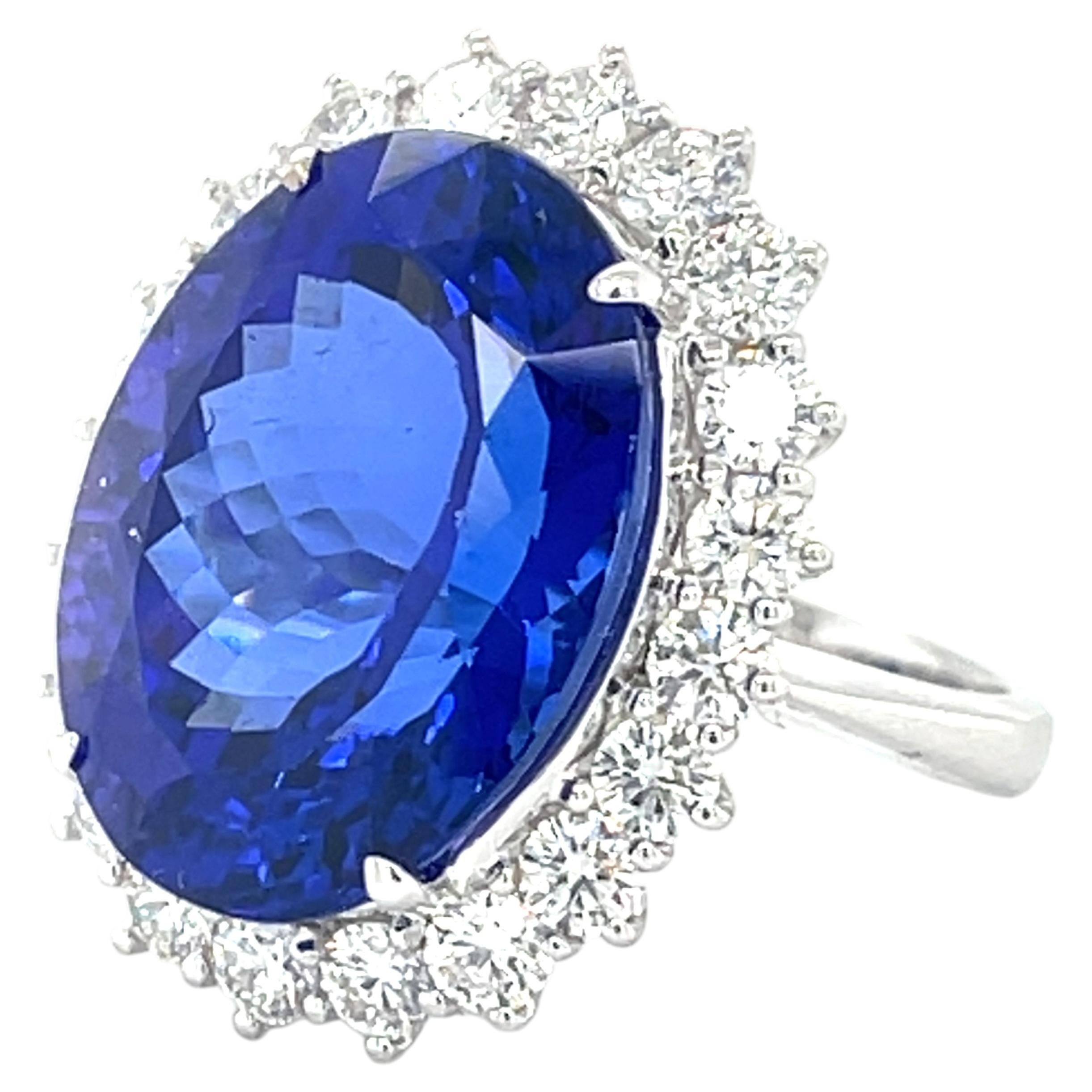 18.22ct Oval Tanzanite and 1.83ct Diamond Ring set in 18k White Gold Size: 6.5 For Sale
