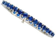 Platinum Tennis Bracelet With 21.50 ct Round Sapphires 7" Long