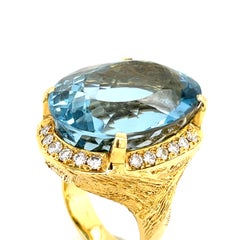 18k Yellow Gold Oval 72.19 ct Aquamarine Ring with Appx 1 ct Diamond Size 7.75