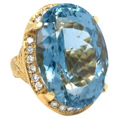18k Yellow Gold Oval 72.19 ct Aquamarine Ring with Appx 1 ct Diamond Size 7.75