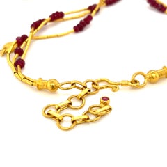 GURHAN Collezione Rain: collana a tre fili in oro 22k con perline di rubino