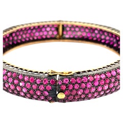 14K Yellow Gold Antiqued Bangle Bracelet w/ 36 cts of Pave Set Rubies 7.5"