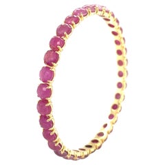 Bracciale Ippolita in oro giallo 18k con rubini, modello "Lollipop", diametro 2,5", 22,9 grammi