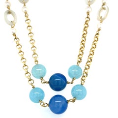 Collana in oro giallo 18k con calcedonio tinto e perle coltivate 42"
