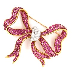 18k Gold, Ruby + 0.75ct Diamond Bow Brooch 2-3/16" x 2" 21.20g