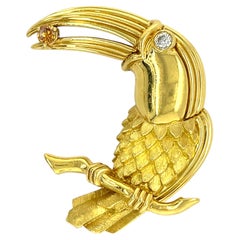 Henry Dunay 18k Yellow Gold Toucan Brooch with White and Orange Diamond Accents