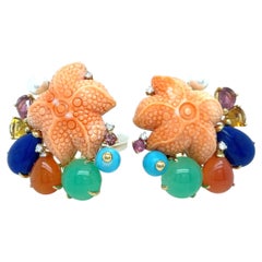 18k Gold, Diamond, and Coral Starfish Clip-on Earrings Diamond Weight: 0.05ct