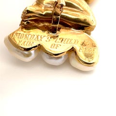 Spilla Ruser in oro 14k, modello "Monday's Child", con perla del fiume Mississippi e zaffiro