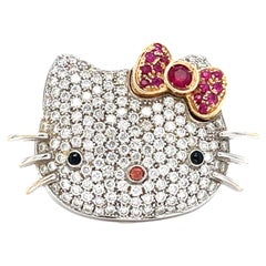 18k White Gold Happy Kitty Diamond and Ruby Ring Size: 7 14.2 grams