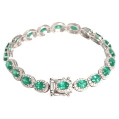Platinum Tennis Bracelet with 8.52ct Emeralds and 2.60ct Diamonds