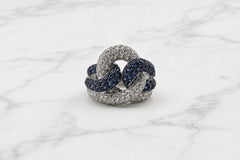 1.42 Ct Diamond And 1.16 Ct Blue Sapphire Love Knote Pavé Ring 18K White Gold