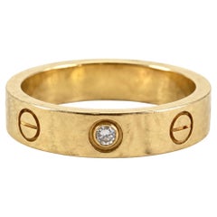 Cartier LOVE Small Model One-Diamond Ring in 18K Yellow Gold, Size 50