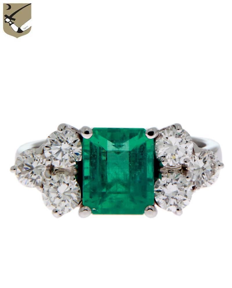 White 18 kt. Gold Engagement Ring, with GIA certified step cut Colombia Emerald, 2.43 ct. Intense green to bluish green color, with 6 natural Diamonds brilliant cut, 1.16 ct, color F/G, clarity VVS.
Emerald GIA Report 2175545799.
