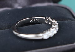 26370 Tiffany & Co Fede nuziale con diamante “Forever Round” da 0,57 ct in platino, 3 mm, misura 5,25