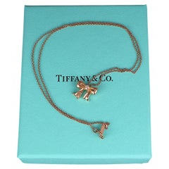 22339 Vintage Tiffany & Co 18K Yellow Gold Diamond Ribbon Bow Pendant Necklace