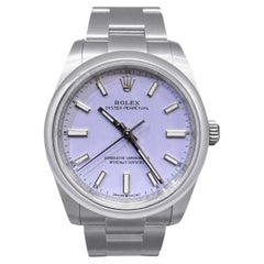 Reloj Rolex Oyster Perpetual de 34 mm con esfera lavanda y caja de acero Oystersteel. NUEVO, CON TODO EL EQUIPO COMPLETO