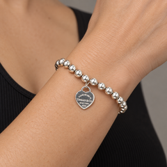 Tiffany & Co. „Return to Tiffany“ Armband aus Sterlingsilber mit Herzperlen