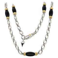 Collana Lagos Caviar in argento sterling e oro con perline nere a coste