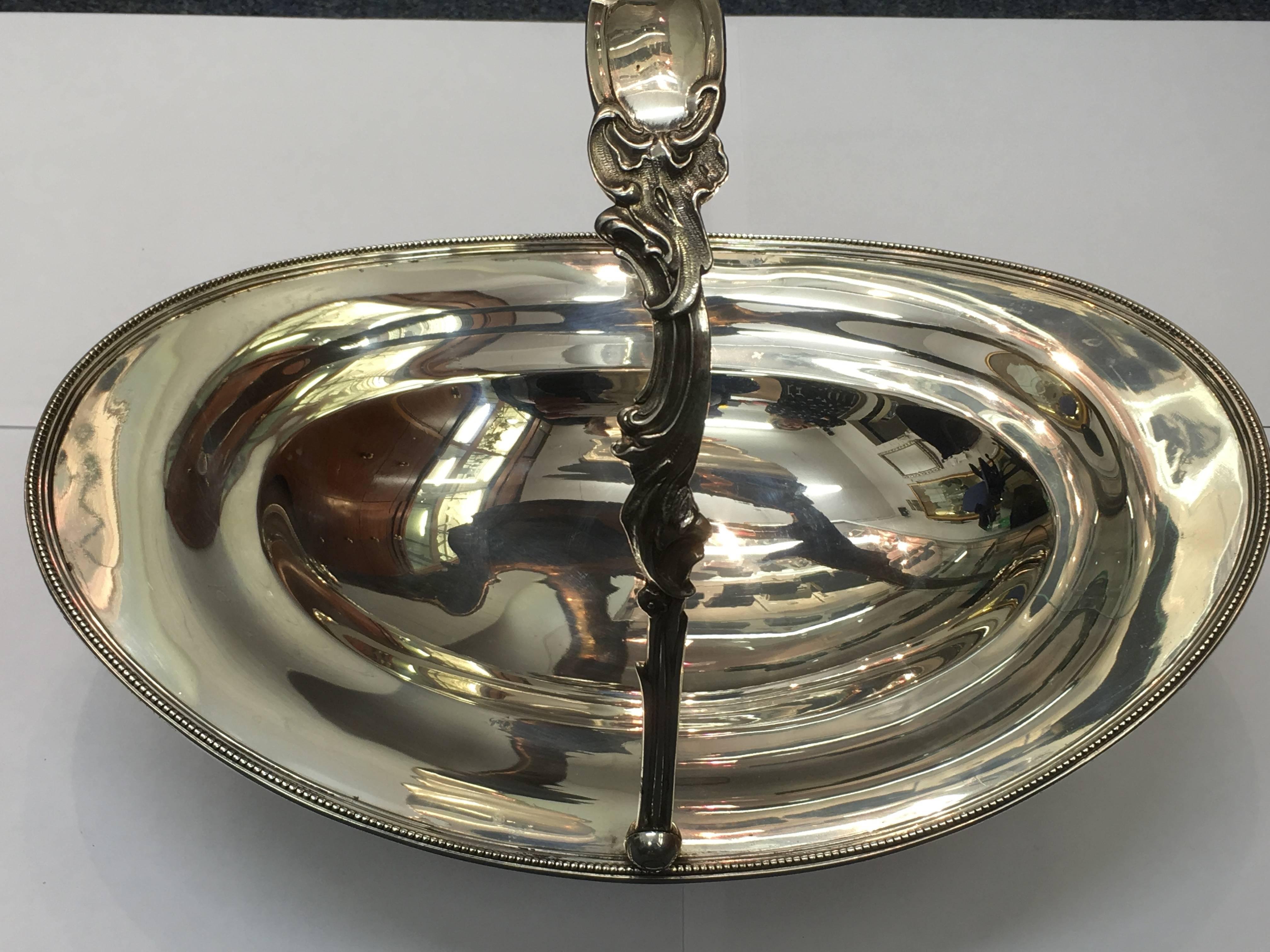 Tiffany Sterling Silver Basket Ideal for the dinning room.
It was made by Tiffany &Amp Ellis C.1850 it stand at 3Inches plus the handle it
stand at 10 Inches. and is on a foot which is fully signed by Tiffany on the reverse. 

