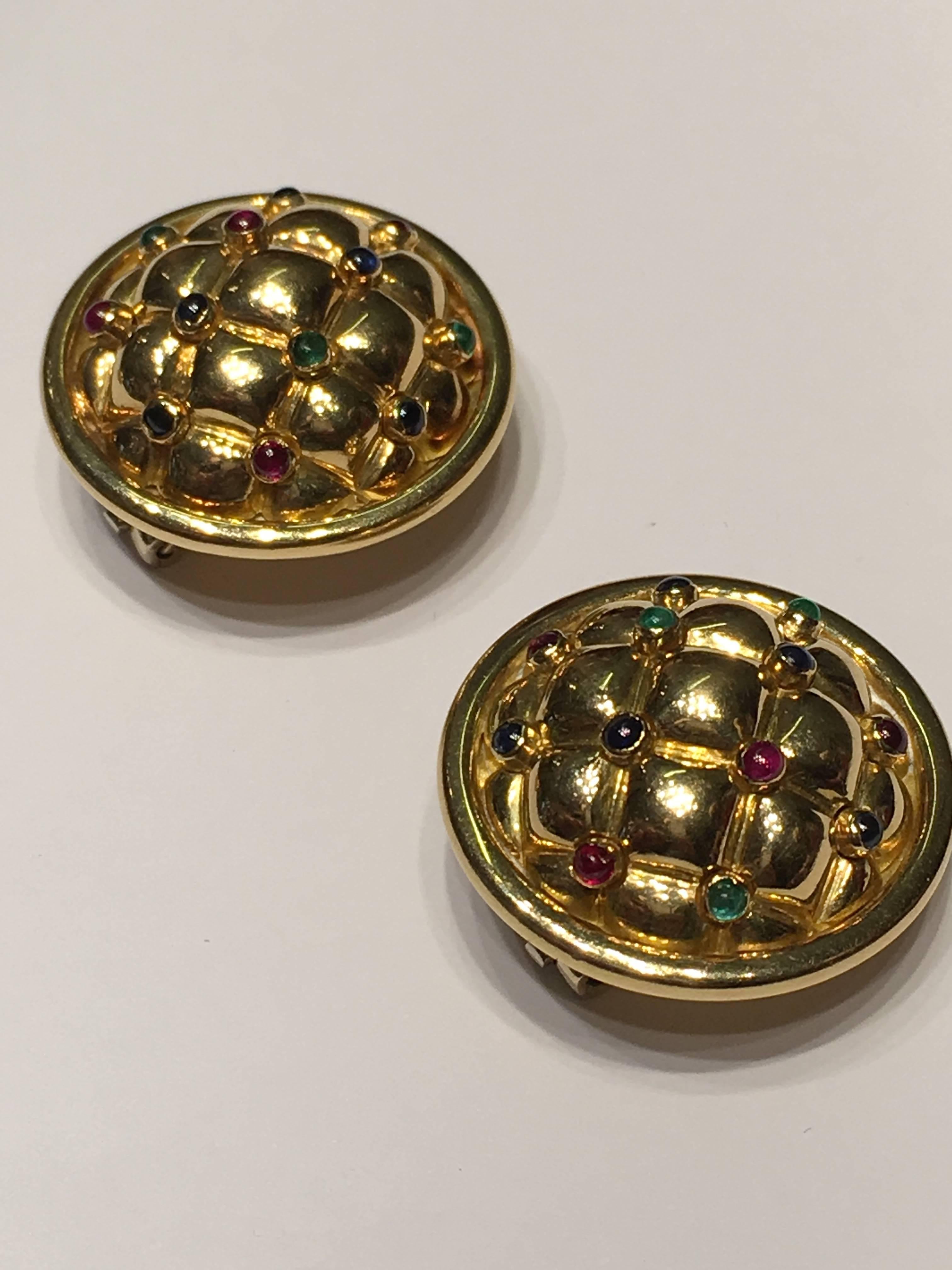 Chaumet Cushion Earrings set with Cabouchon Emeralds, Sapphires and Rubies
set in 18ct Yellow gold with a clip on fitting suiable for non pierced ears.
We can at no extra charge add pins to the earring fittings.
Fully signed by