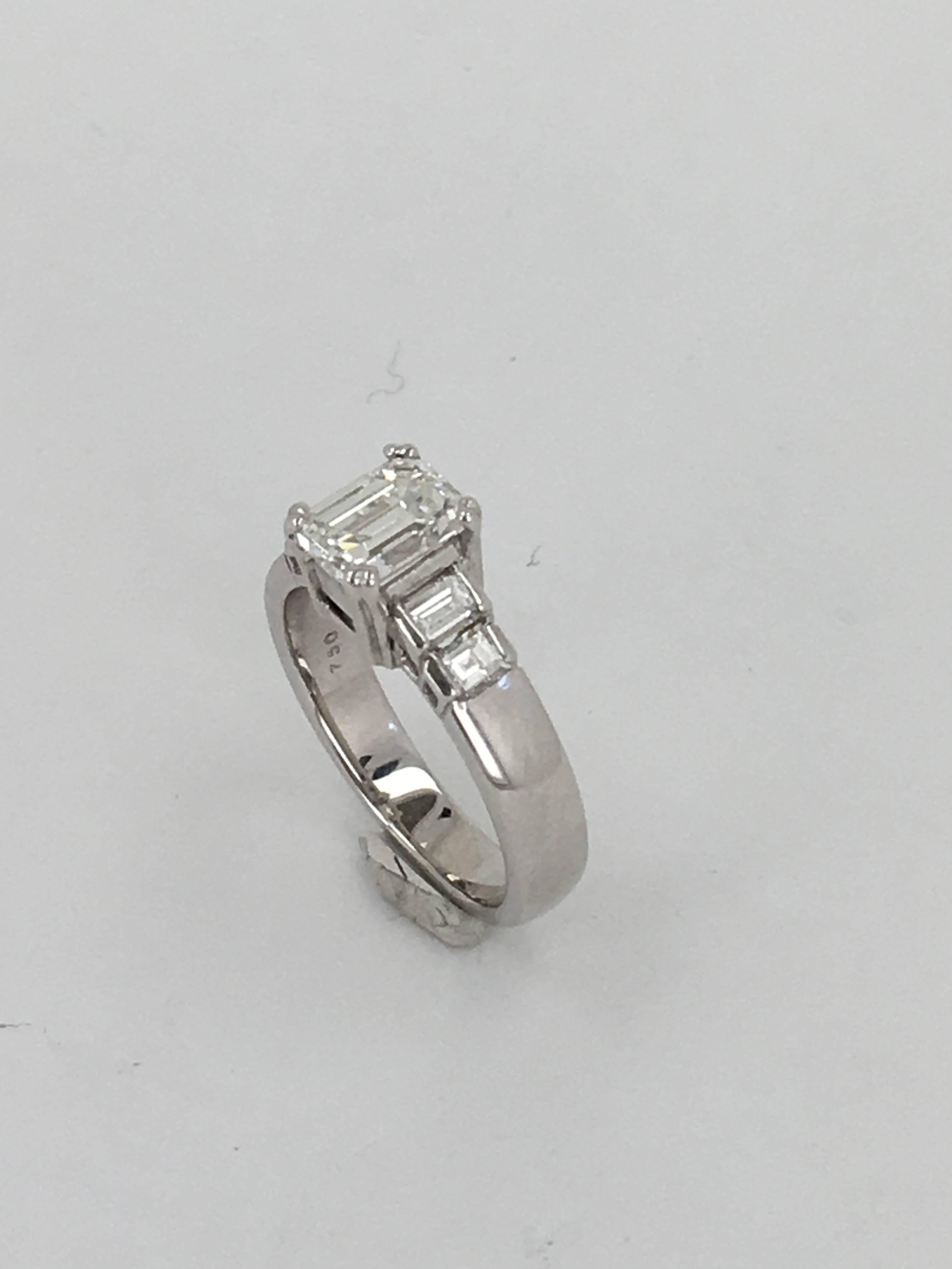 Modern 1.21 Carat Emerald Cut Diamond Gold Solitaire Ring For Sale