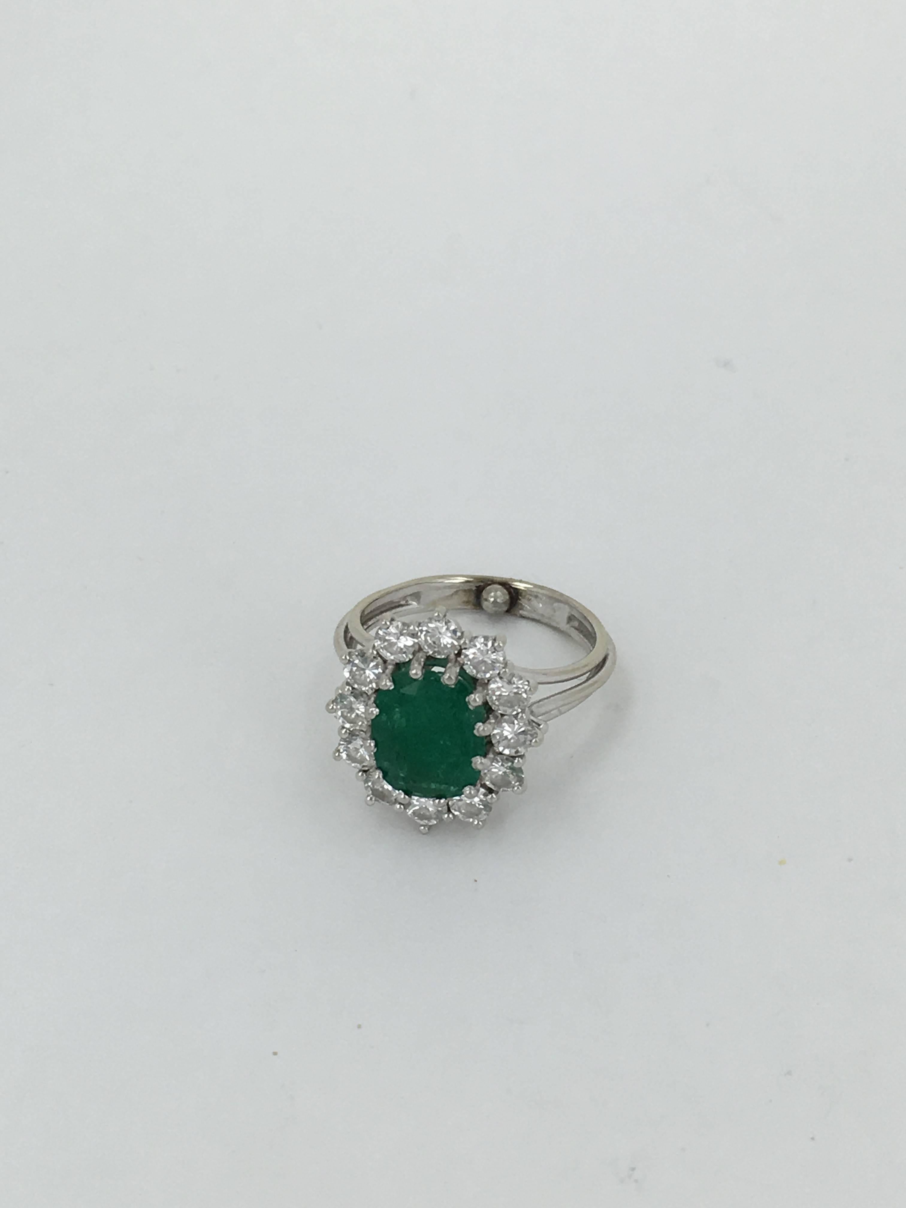 2.50 Carat Oval Cut Emerald Diamond Gold Cluster Ring In New Condition For Sale In London, GB